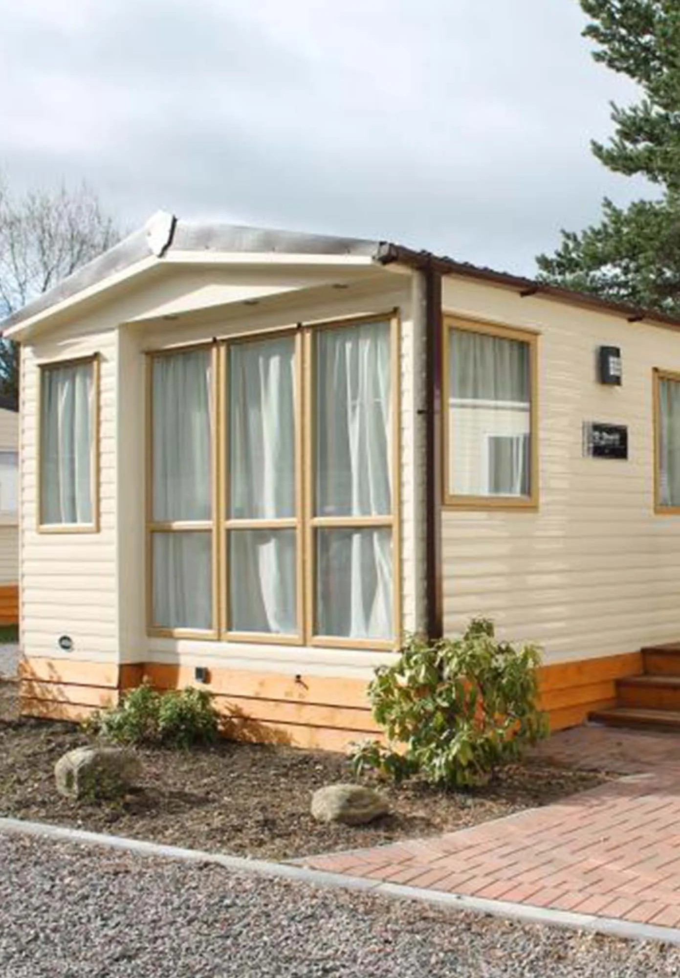 Static caravan double-glazed lodge sited at park